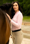 A rider wearing KL Select Gabriella Breeches in Beige