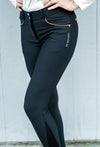 A rider wearing KL Select Gabriella Breeches in Black