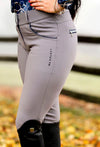 A rider wearing KL Select Gabriella Breeches in Grey